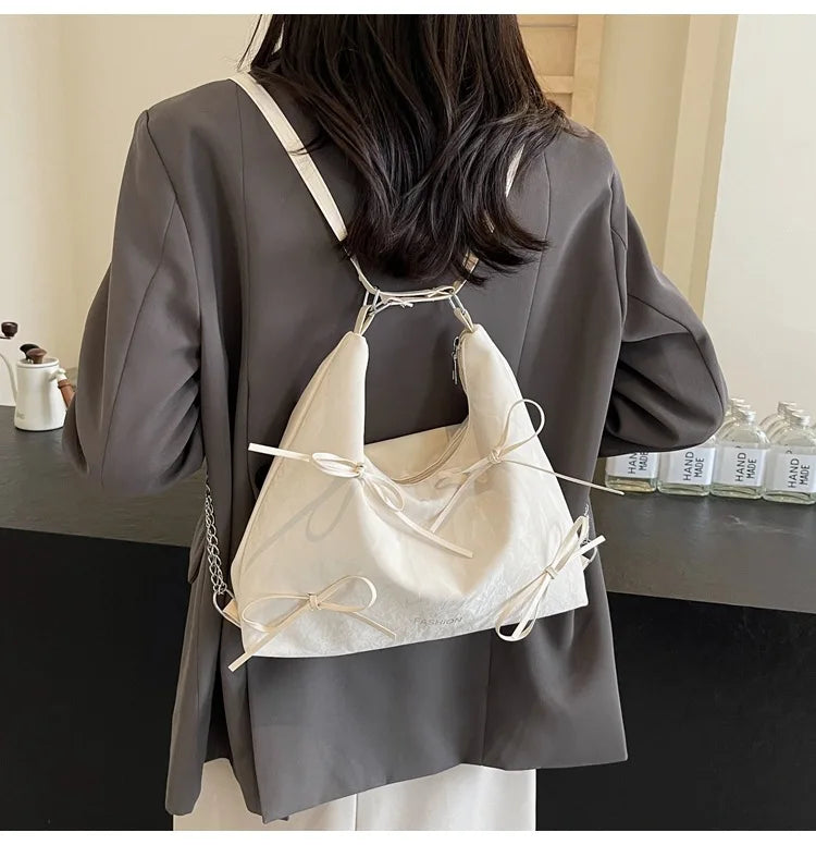 Qfdian Fashion Korean version bow single shoulder bag, female niche design, versatile casual bag, tote bag