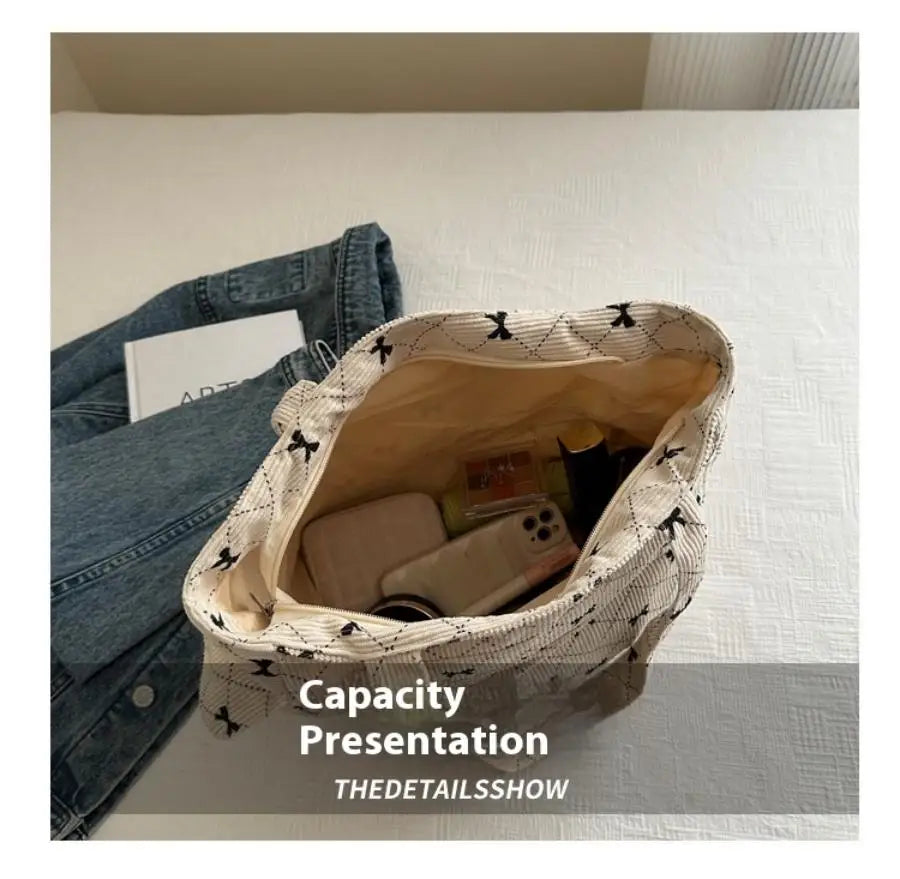 Qfdian Single shoulder crossbody bow, fresh underarm texture, large capacity tote bag, handbag, women's bag