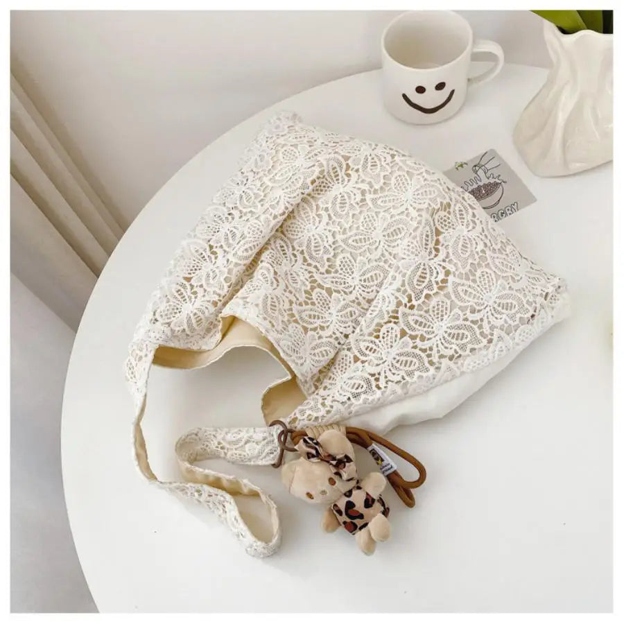 Qfdian Lace countryside style shoulder bag for women, simple and fashionable, large capacity commuting tote bag, shoulder bag