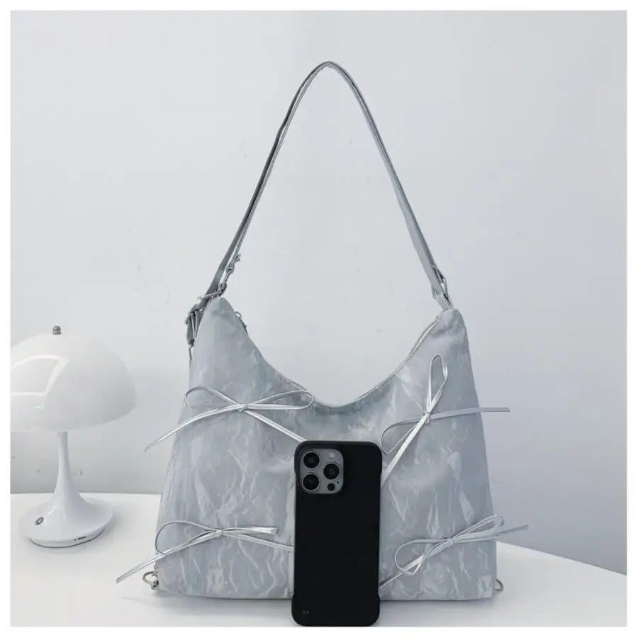 Qfdian Fashion Korean version bow single shoulder bag, female niche design, versatile casual bag, tote bag