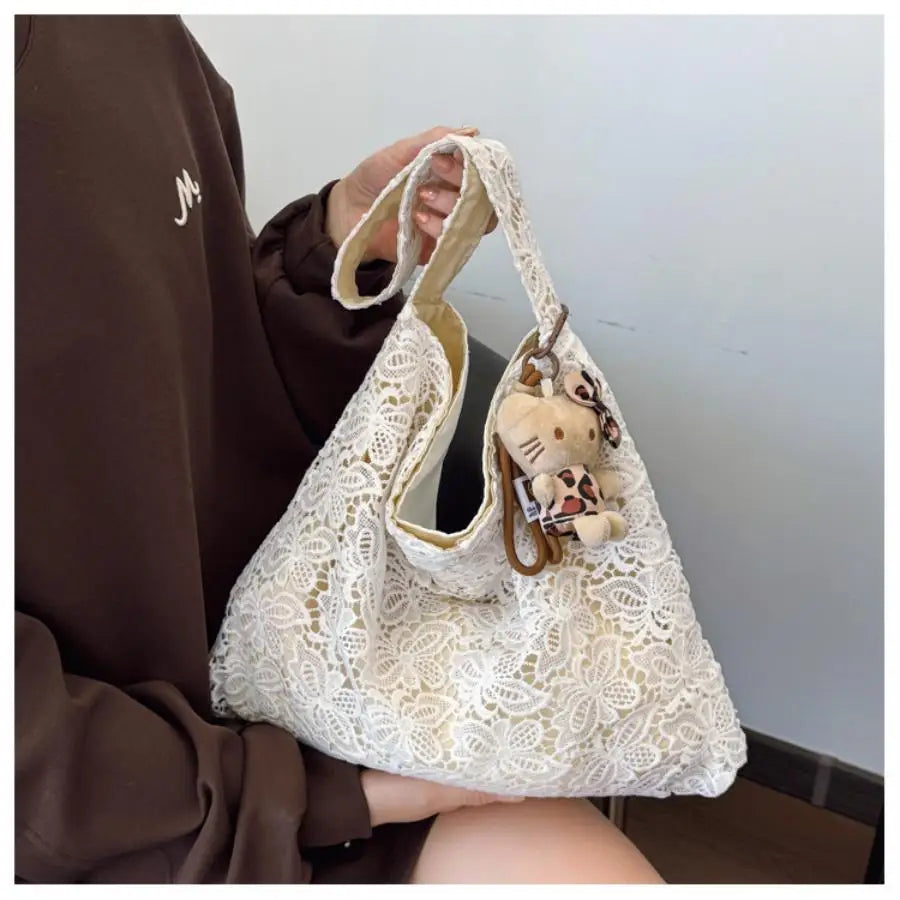 Qfdian Lace countryside style shoulder bag for women, simple and fashionable, large capacity commuting tote bag, shoulder bag
