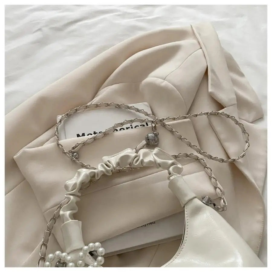 Qfdian Fashionable pleated handbag for women, Bow tie pendant ,fashionable shoulder bag, simple and stylish crossbody bag, chain trend
