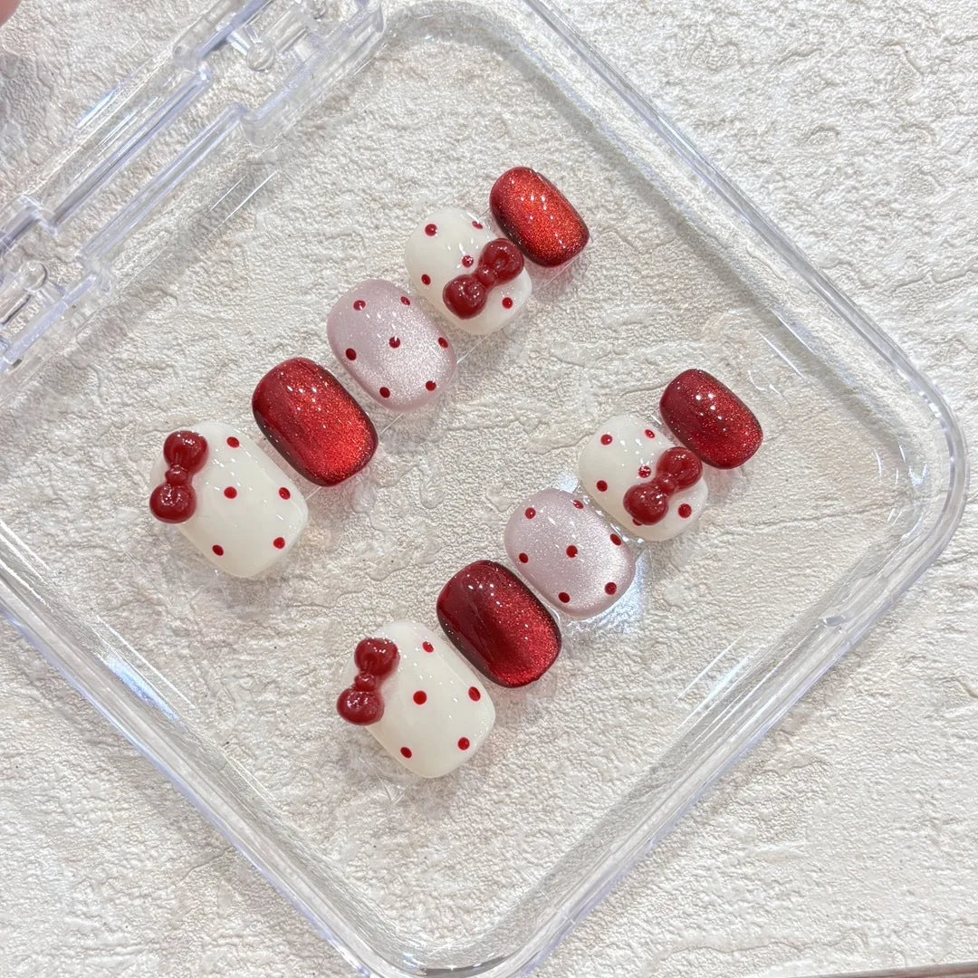 Qfdian 10pcs Handmade Short Cat Eye Dot Red Bow Removable Christmas Press on Nails Acrylic Cute Fake Nails Sweet False Nails for Hands