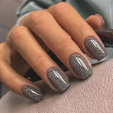 Qfdian 24Pcs Simple False Nails with Glue Short Almond Fake Nails Glitter Aurora Round Head Full Cover Nail Tips Oval Press on Nails