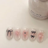 Qfdian 10Pcs Pink Handmade Press on Nails Short Blush Artificial False Nail Tips Black Bow Designed Sweet Girl Full Cover Fingernail