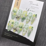 Qfdian  Nature-Inspired Soft Green Floral Press-On Nails with Flexible Silk Botanicals and Oxidation-Resistant Metal Details Perfect for