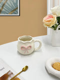 Qfdian Ins-style girly girl hand-held bowknot coffee cup, afternoon tea ceramic cup, cute mug