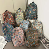 Qfdian New Chinese Style Woven Flower Backpack 2025 New Large Capacity Fashionable Lightweight Travel Bag Backpack