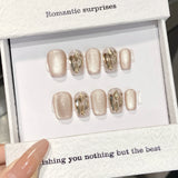 Qfdian Handmade Short Press on Nails Sparkling Champagne Cat's Eye Fake Nail Tips Wearable Full Cover Fashion Crystal False Nails