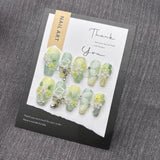 Qfdian  Nature-Inspired Soft Green Floral Press-On Nails with Flexible Silk Botanicals and Oxidation-Resistant Metal Details Perfect for
