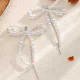 Qfdian  Luxury high-end bow long imitation pearl swinging earrings, elegant party wedding earrings, fashionable accessories, gifts