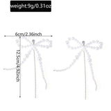 Qfdian  Luxury high-end bow long imitation pearl swinging earrings, elegant party wedding earrings, fashionable accessories, gifts