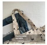 Qfdian Single shoulder crossbody bow, fresh underarm texture, large capacity tote bag, handbag, women's bag