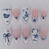 Qfdian  24pcs Simple Blue Bowknots Press On Nails Glossy White Edge French Style Flower Brid Pattern Spring False Nails Almond Fake Nail