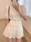 Qfdian  Korean Unique Bubble Sleeve Top High Waisted Wooden Ear Skirt Two-piece Set Sweet Summer Women's Fashion Solid Color Set Skirt
