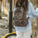 Qfdian New Chinese Style Woven Flower Backpack 2025 New Large Capacity Fashionable Lightweight Travel Bag Backpack