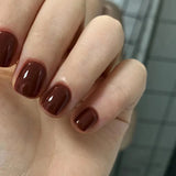 Qfdian 24Pcs Glitter Wine Red Solid Color Fake Nails Press on Short Round False Nails Finished Detachable Wearable Full Cover Nail Tips