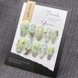 Qfdian  Nature-Inspired Soft Green Floral Press-On Nails with Flexible Silk Botanicals and Oxidation-Resistant Metal Details Perfect for