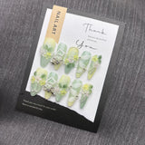Qfdian  Nature-Inspired Soft Green Floral Press-On Nails with Flexible Silk Botanicals and Oxidation-Resistant Metal Details Perfect for