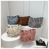 Qfdian Single shoulder crossbody bow, fresh underarm texture, large capacity tote bag, handbag, women's bag