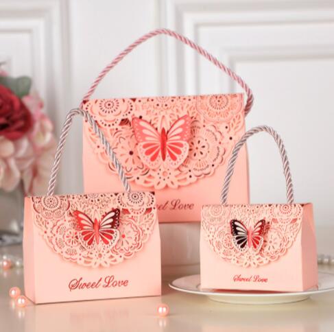 Qfdian Party decoration hot sale new 30Pcs/lot High-quality Laser Cut Butterfly Flower Gift Bags Candy Boxes Wedding favors Portable Gift Box Party Favor Decoration